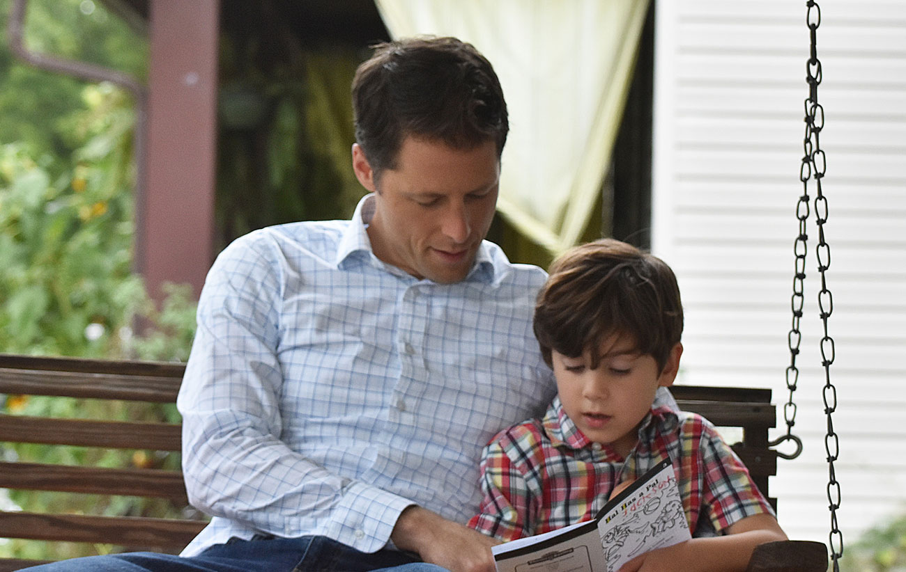 stephen-smith-reading-with-son